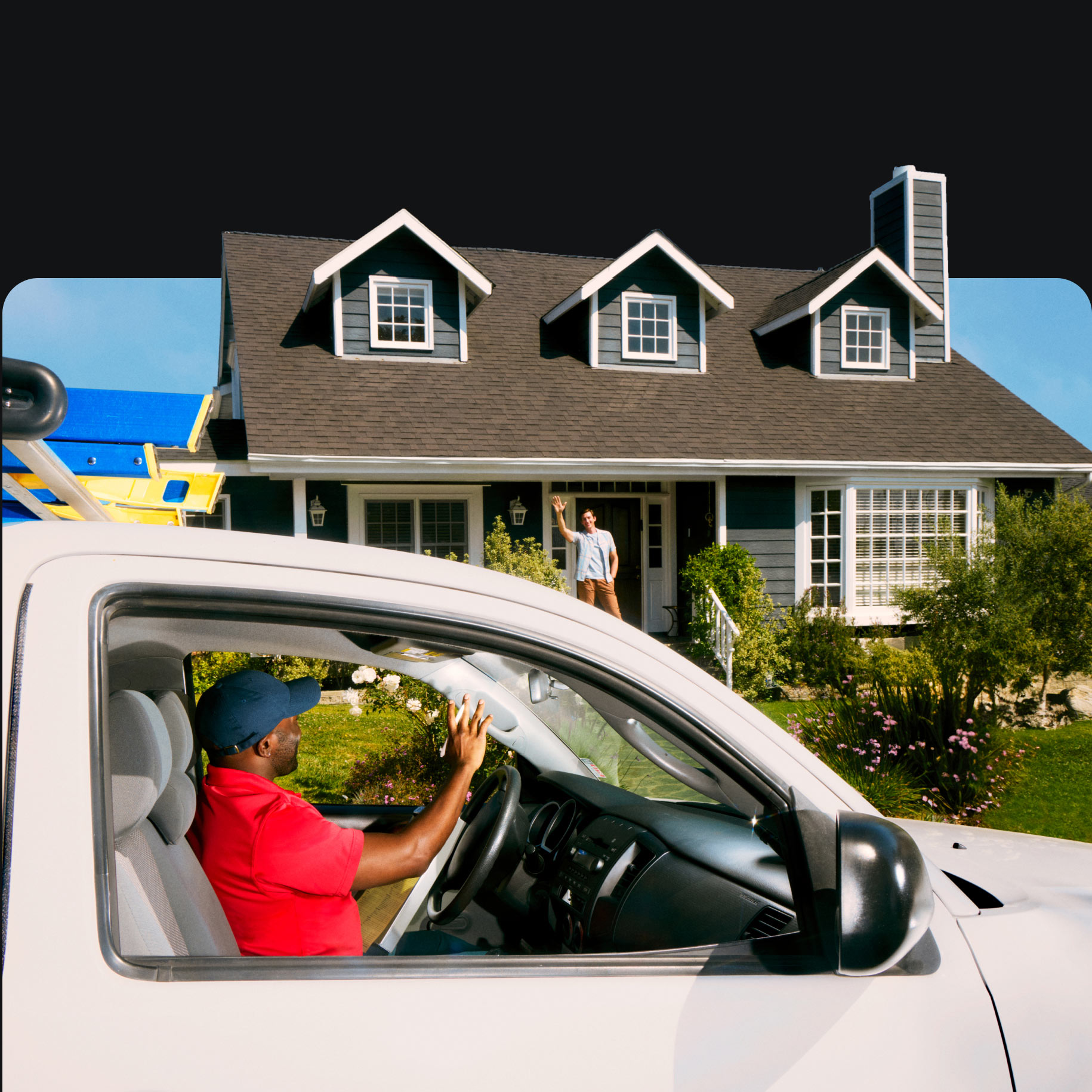 Contractor waving at a customer from their truck.